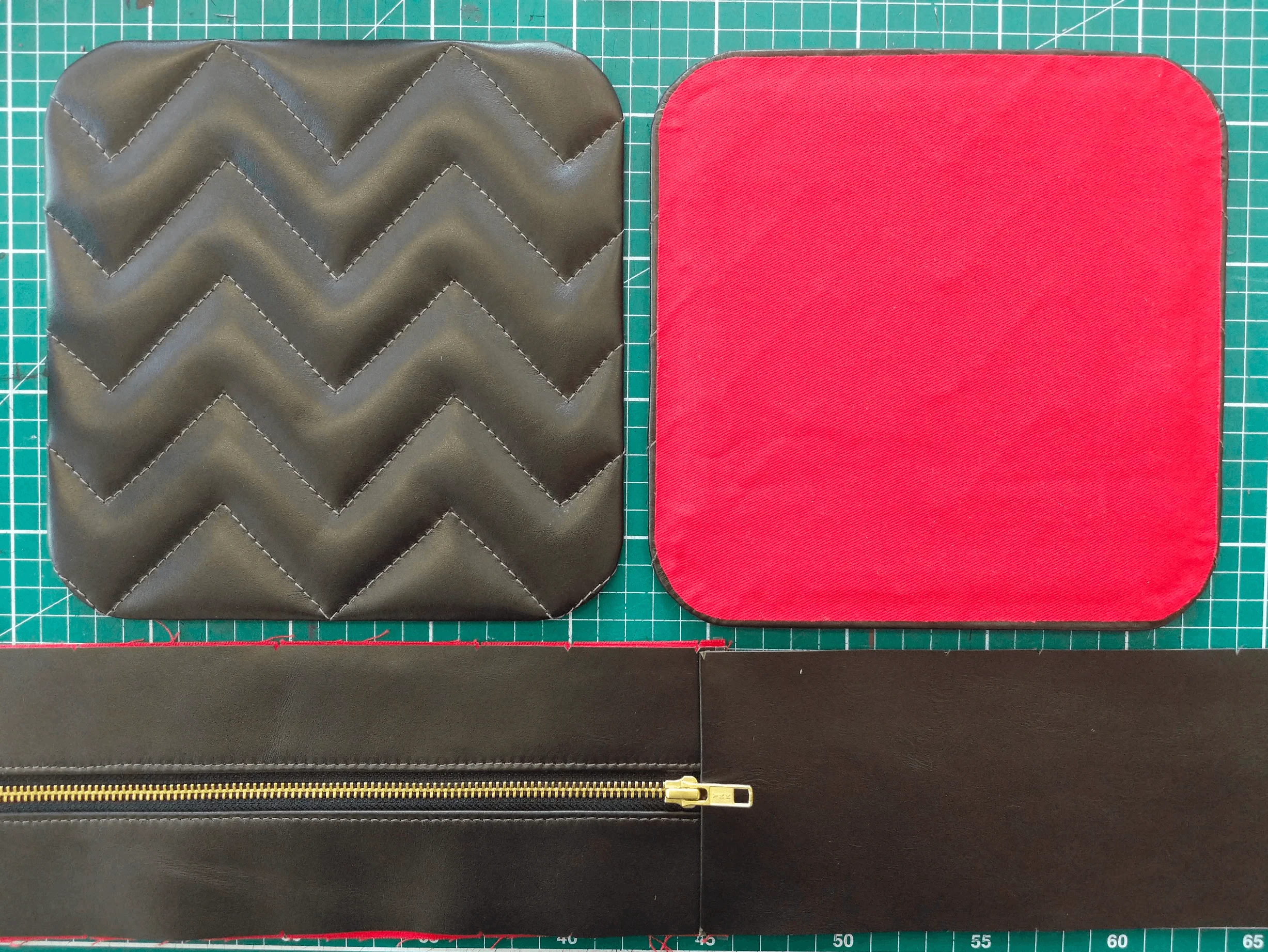 Cut leather and lining pieces for a quilted bag