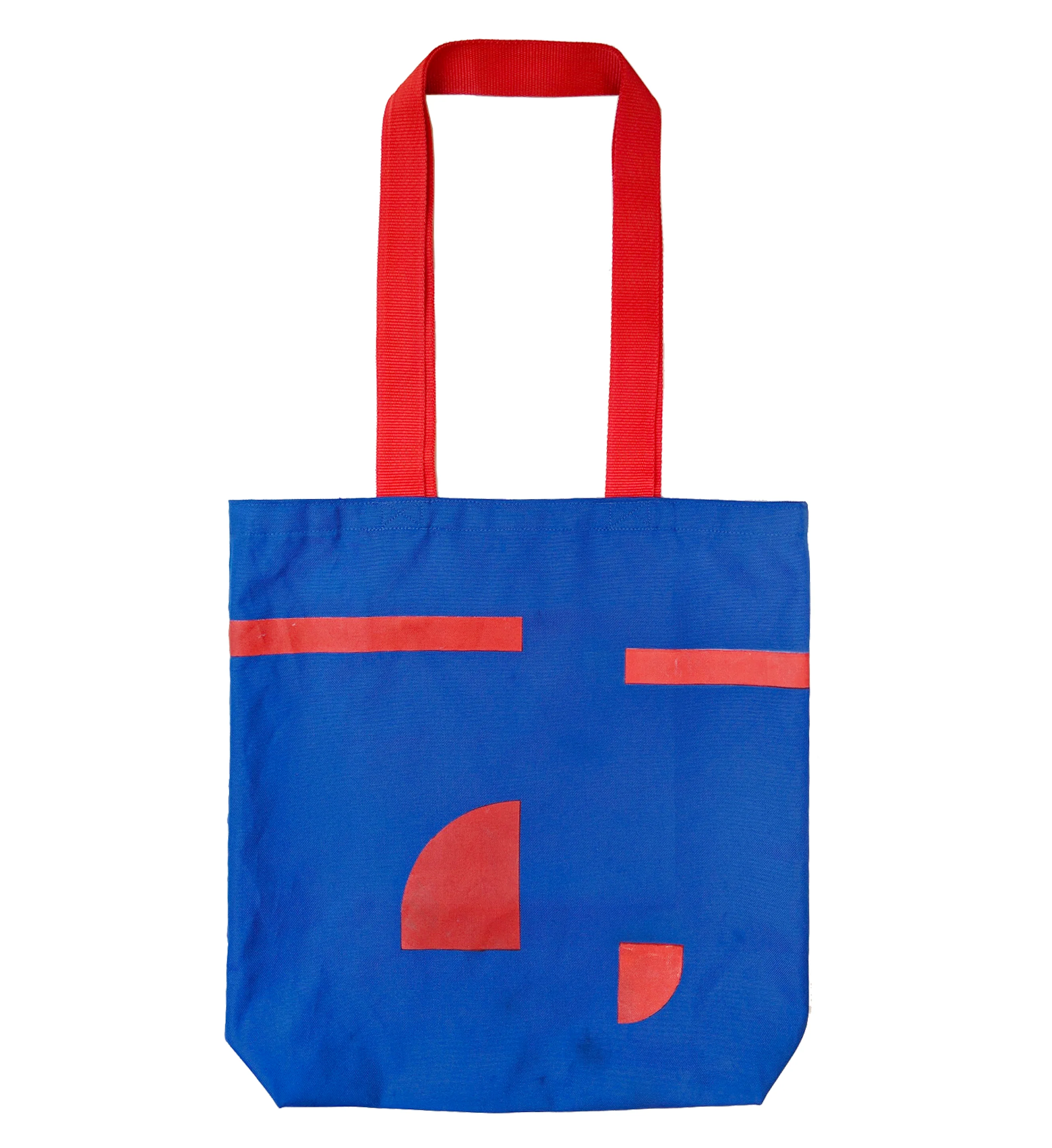 Red and blue printed zippered bag back