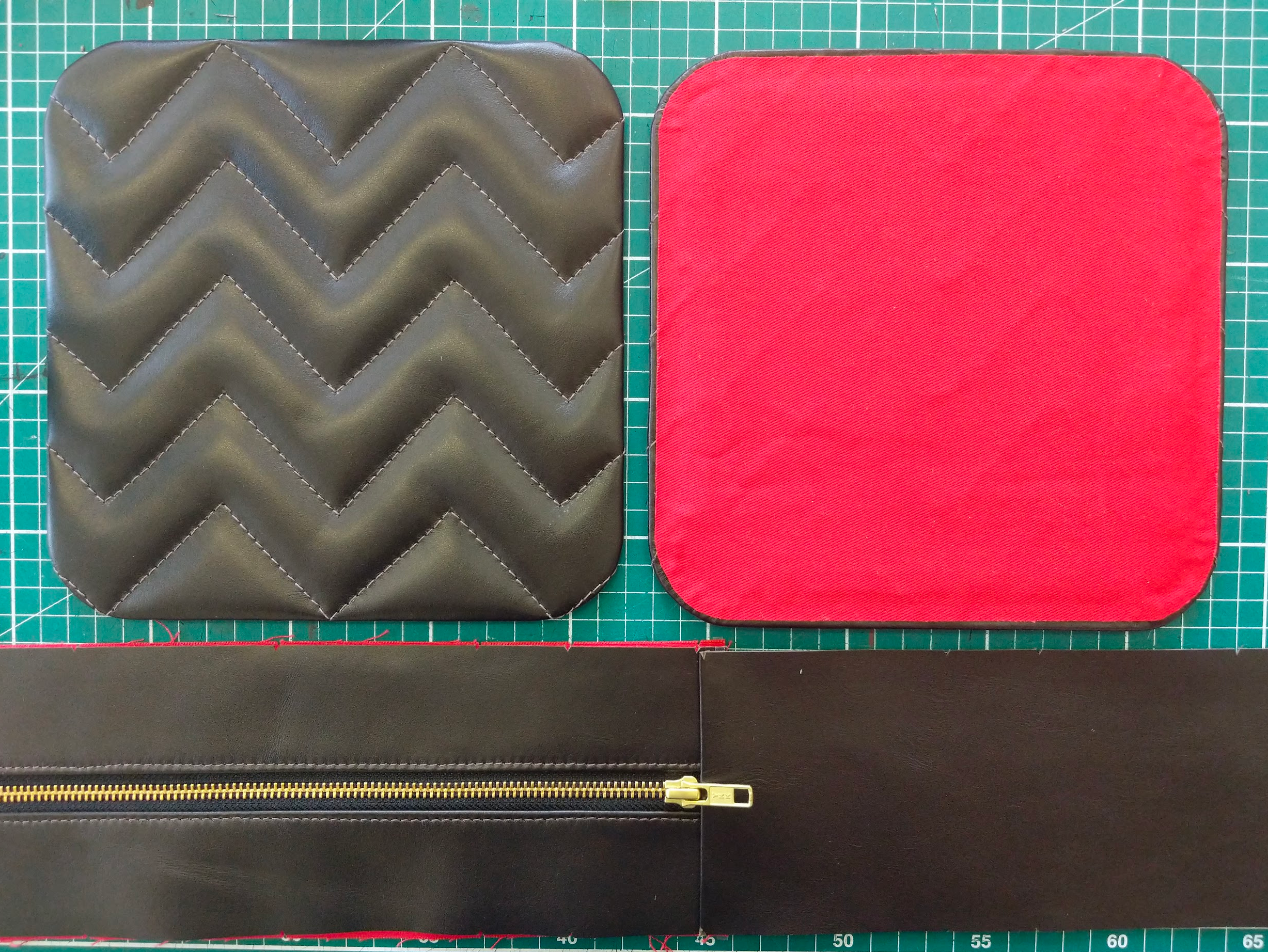 Cut leather and lining pieces for a quilted bag