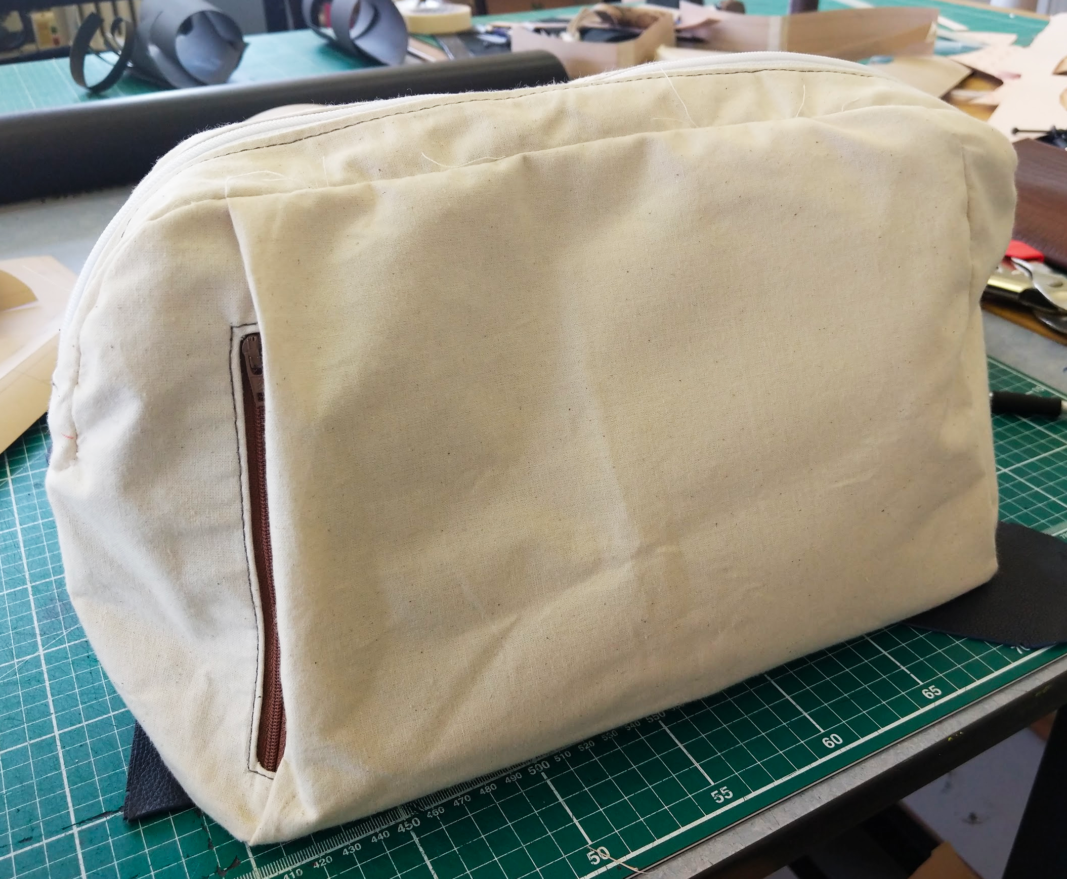 Sewn canvas pouch with zipper